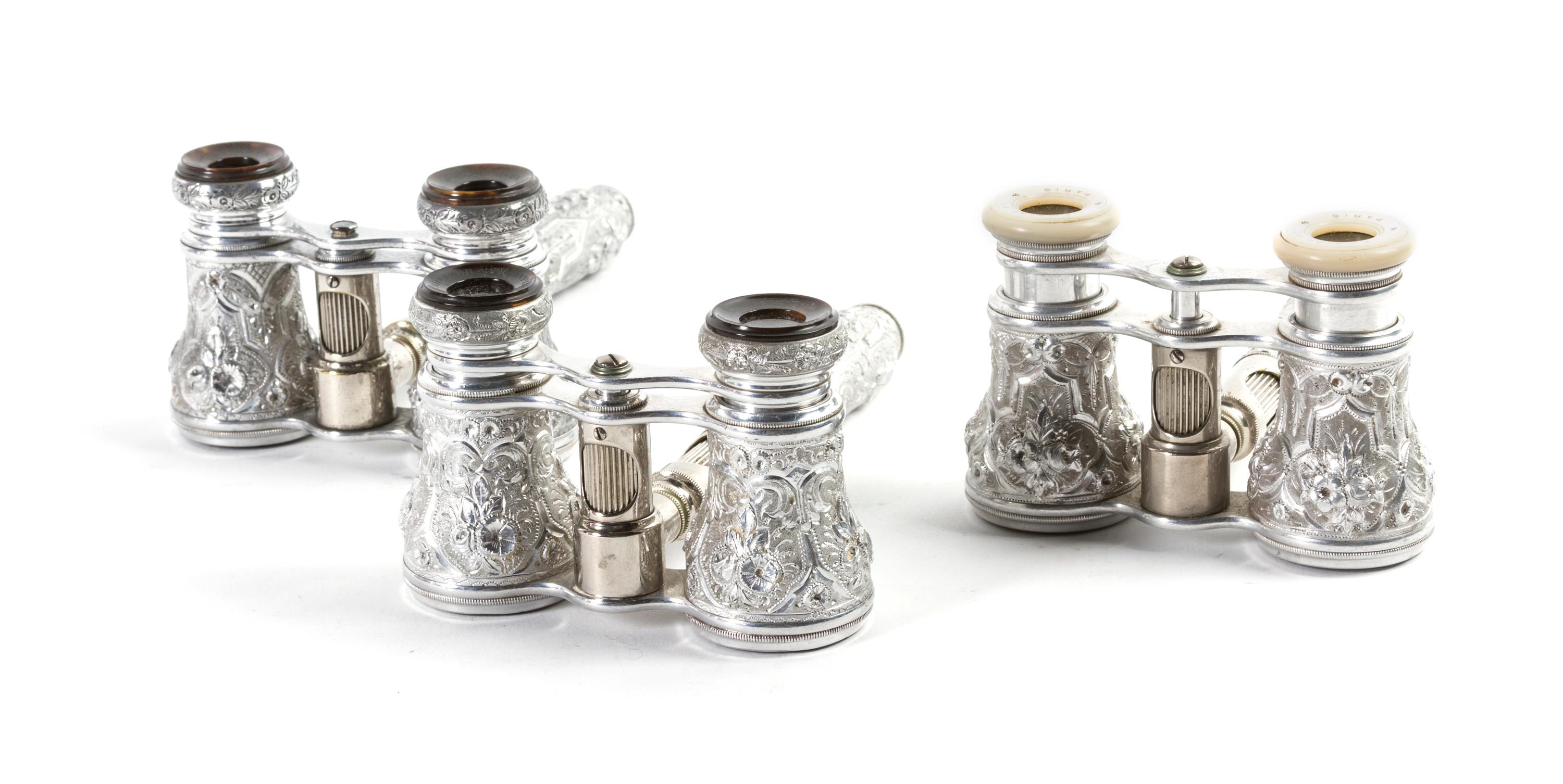 Three Pairs of French Bright Cut Aluminum Opera Glasses, Width 3 7/8 inches.