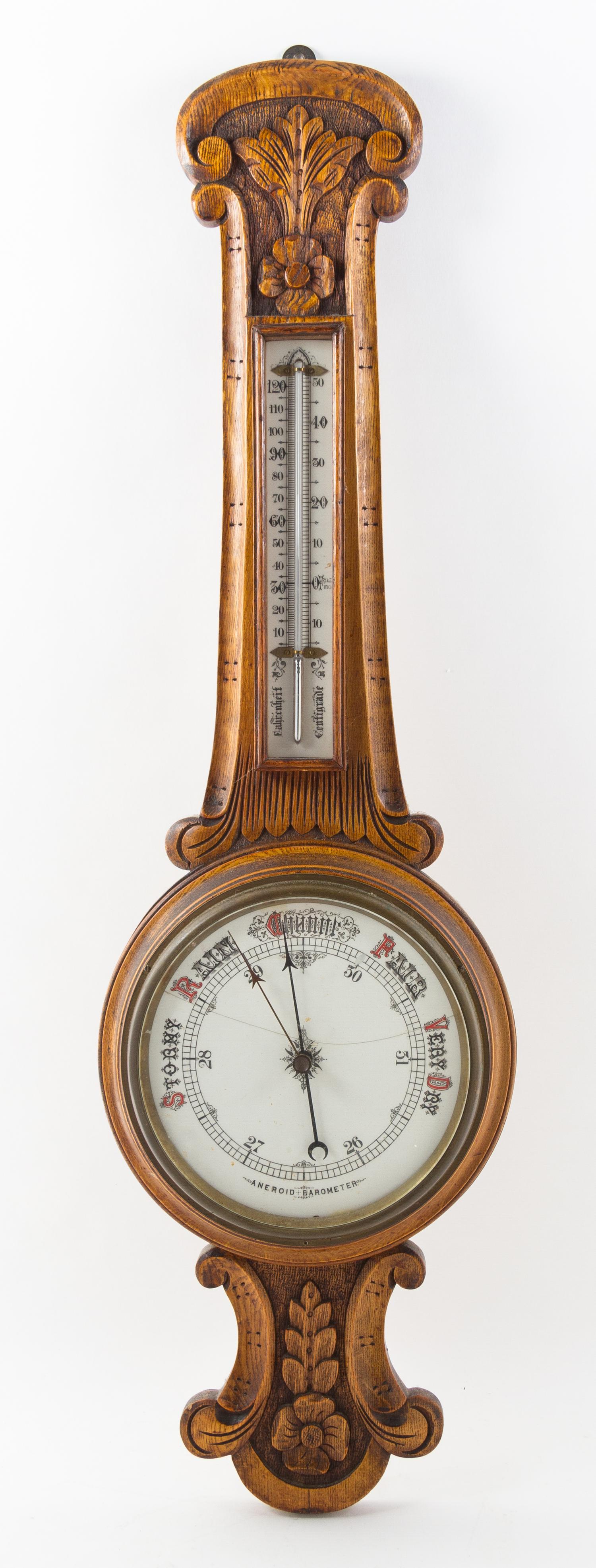 An Oak Wheel Barometer Height 35 1/2 inches. — 19TH/20TH CENTURY