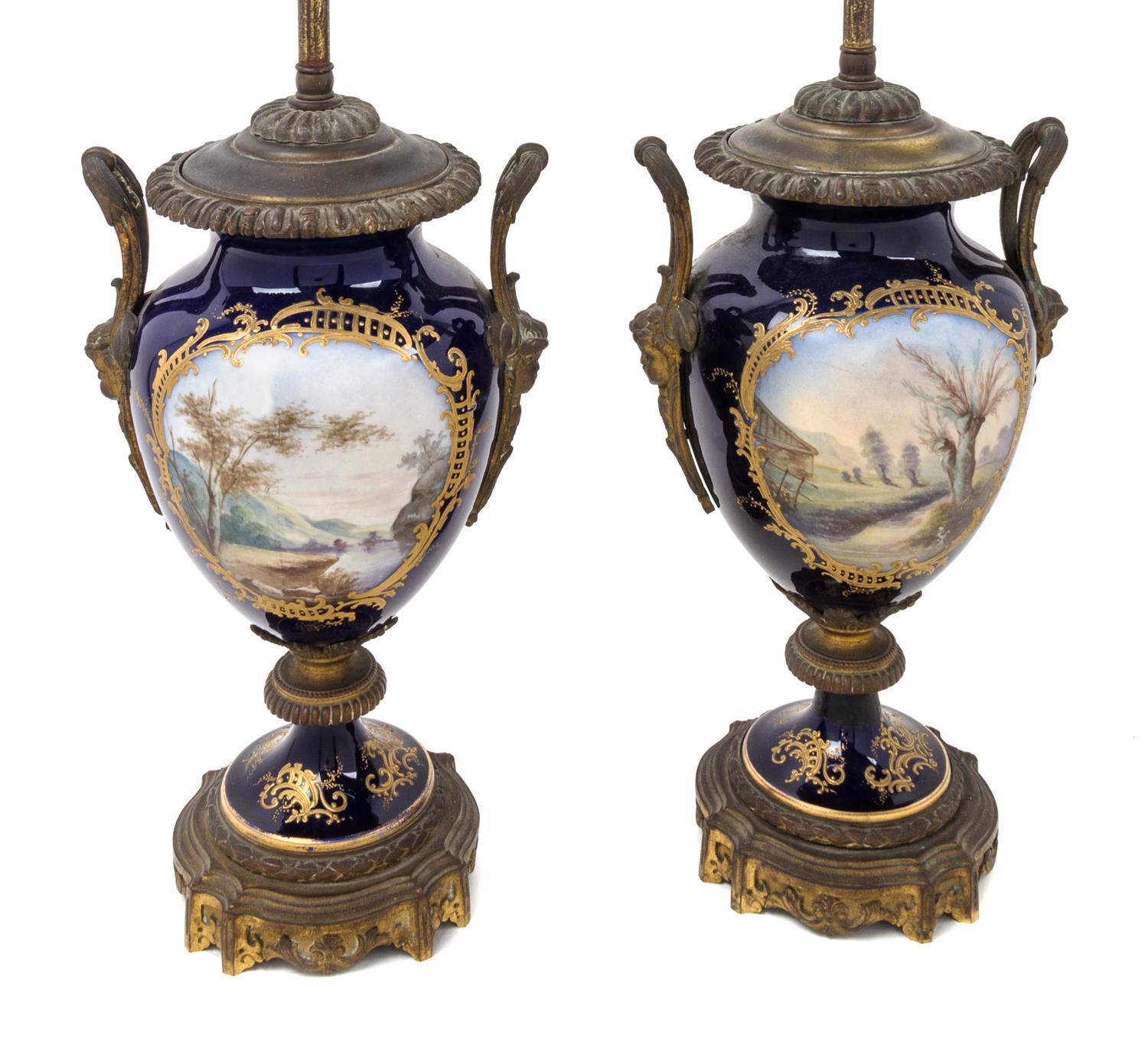 A Pair of Sevres Style Gilt Bronze Mounted Porcelain Vases Height 23 1/2 inches overall.