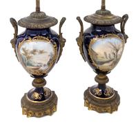 A Pair of Sevres Style Gilt Bronze Mounted Porcelain Vases Height 23 1/2 inches overall.