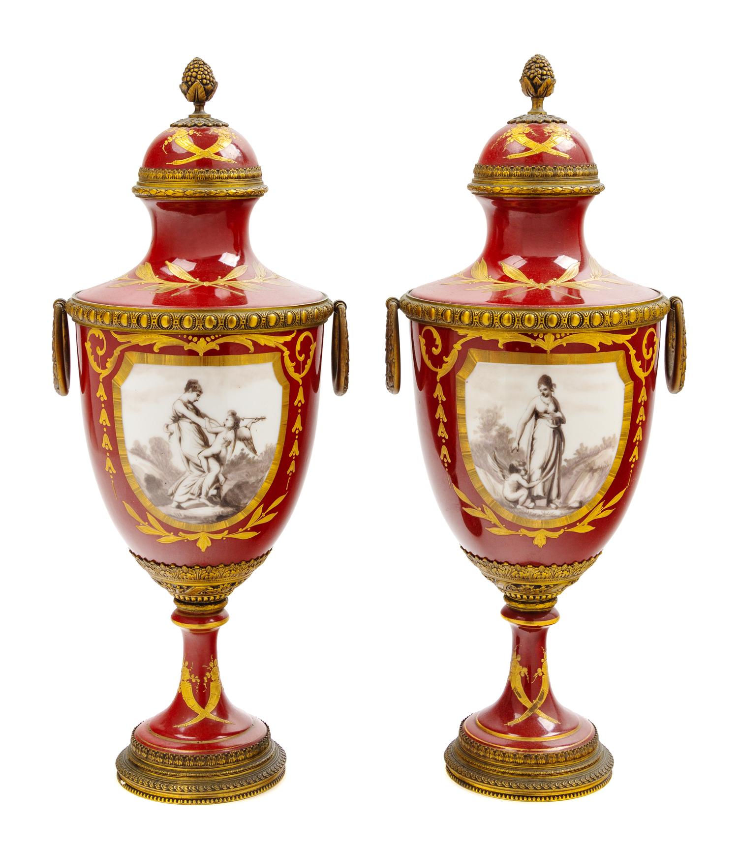 A Pair of French Gilt Metal Mounted Porcelain Urns Height 17 1/8 inches. — LATE 19TH CENTURY