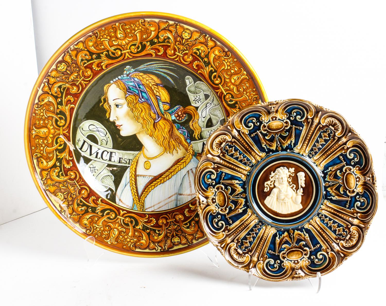 A Collection of Four Polychrome Majolica Chargers Diameter of largest 22 inches.