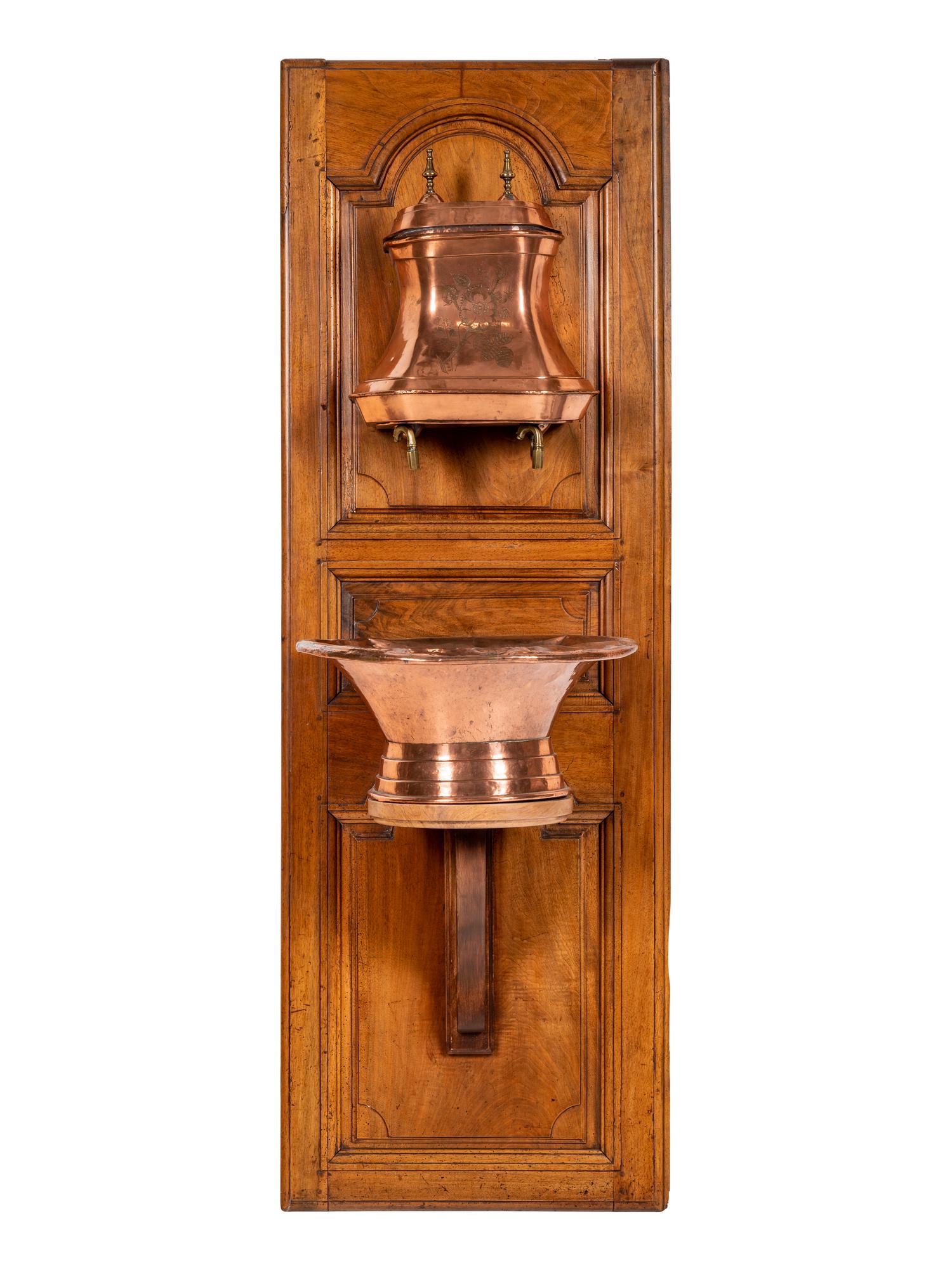 A French Copper Lavabo and Basin Mounted to a Walnut Cabinet Door