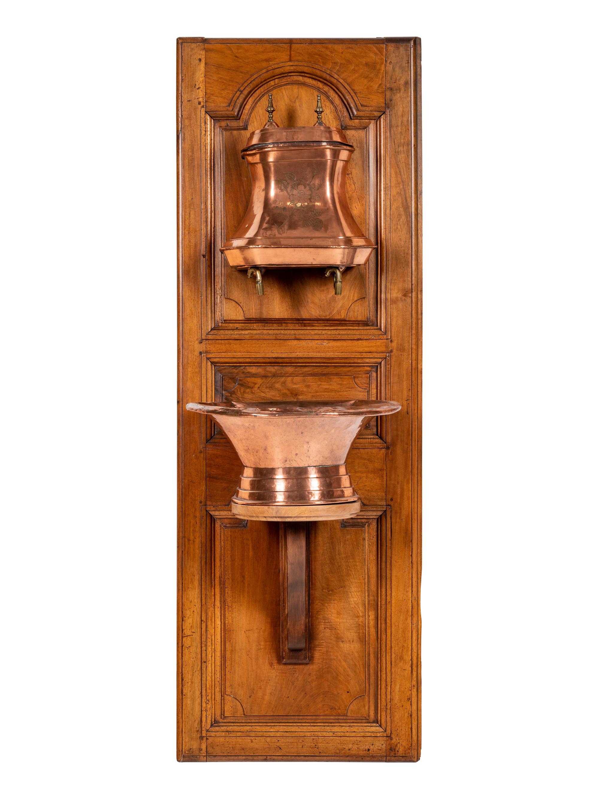 A French Copper Lavabo and Basin Mounted to a Walnut Cabinet Door