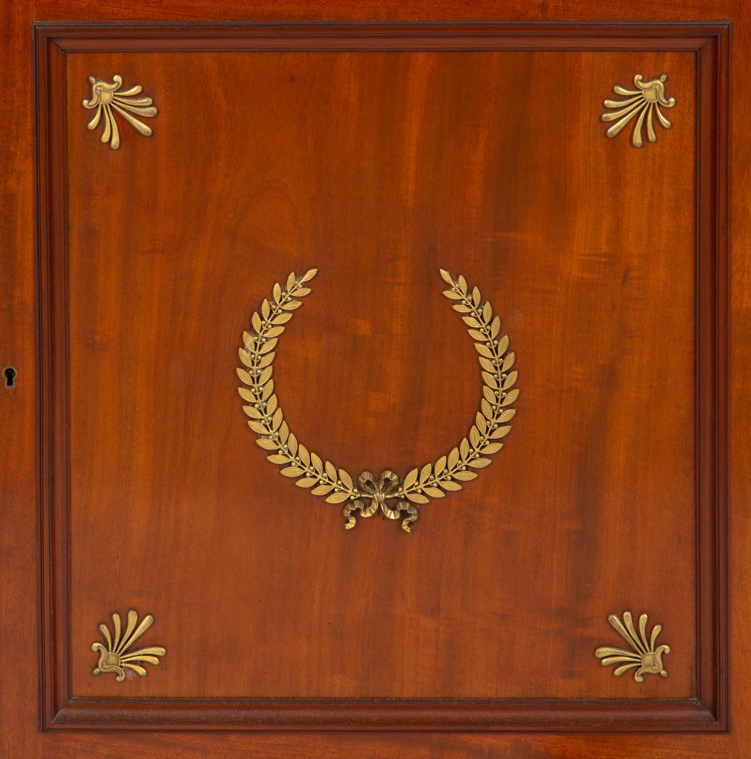A French Empire Gilt Metal Mounted Mahogany Marble Top Sideboard