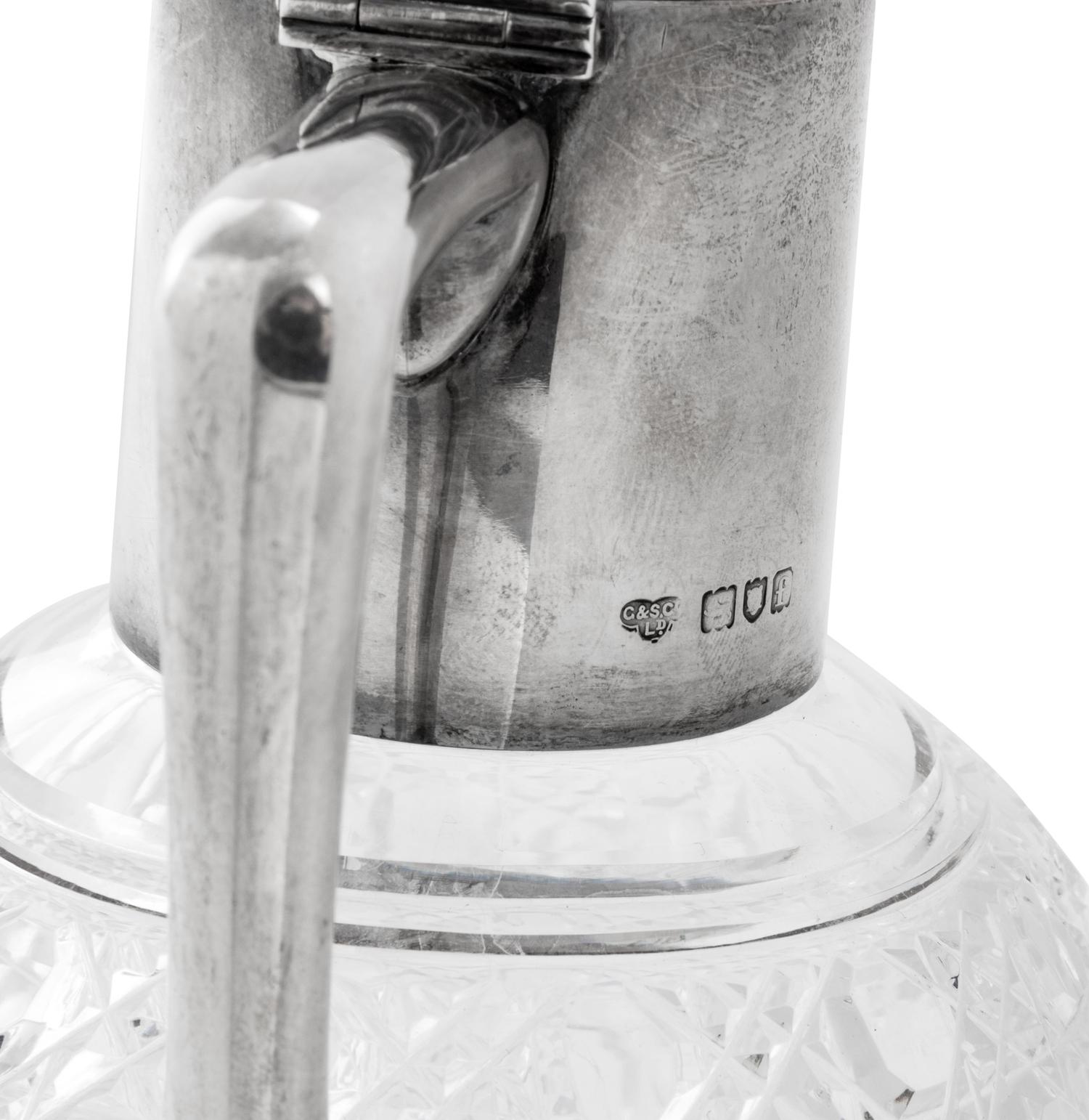 An Edwardian Silver-Mounted Cut-Glass Claret Jug