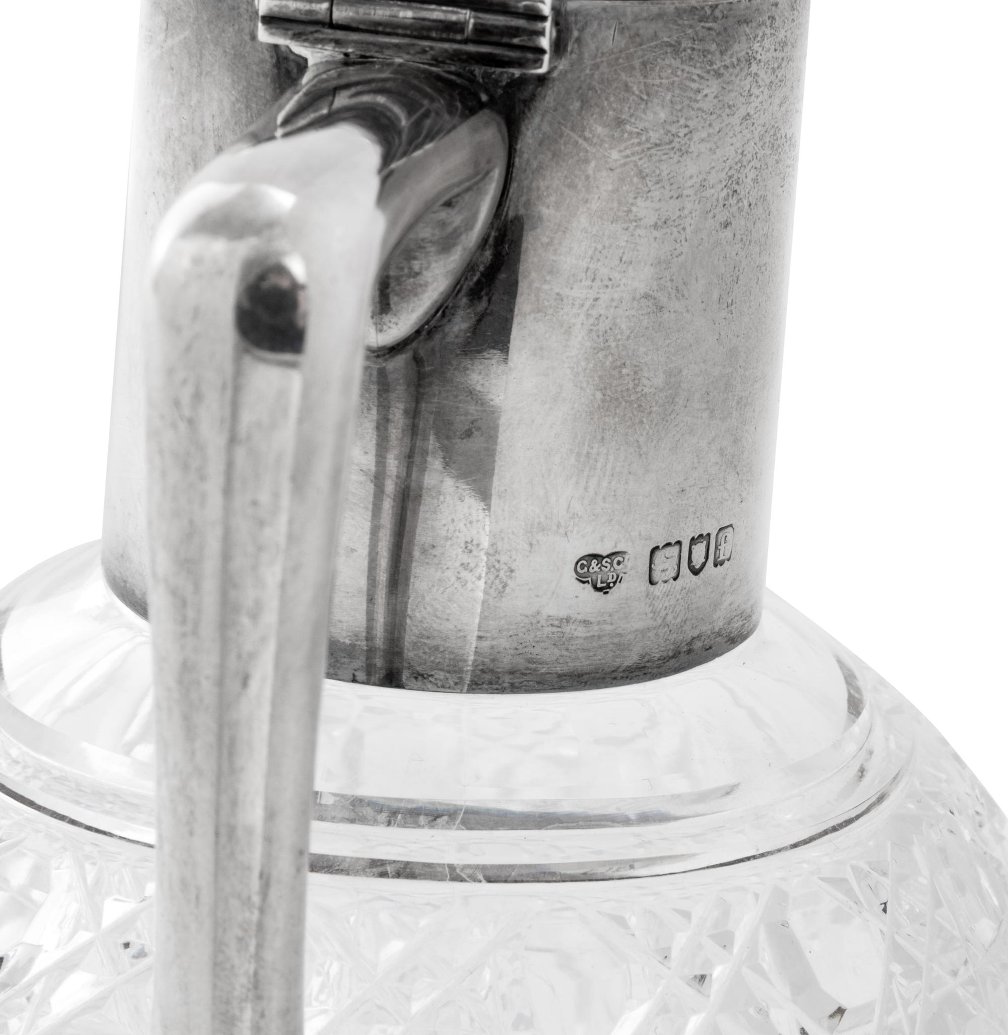 An Edwardian Silver-Mounted Cut-Glass Claret Jug