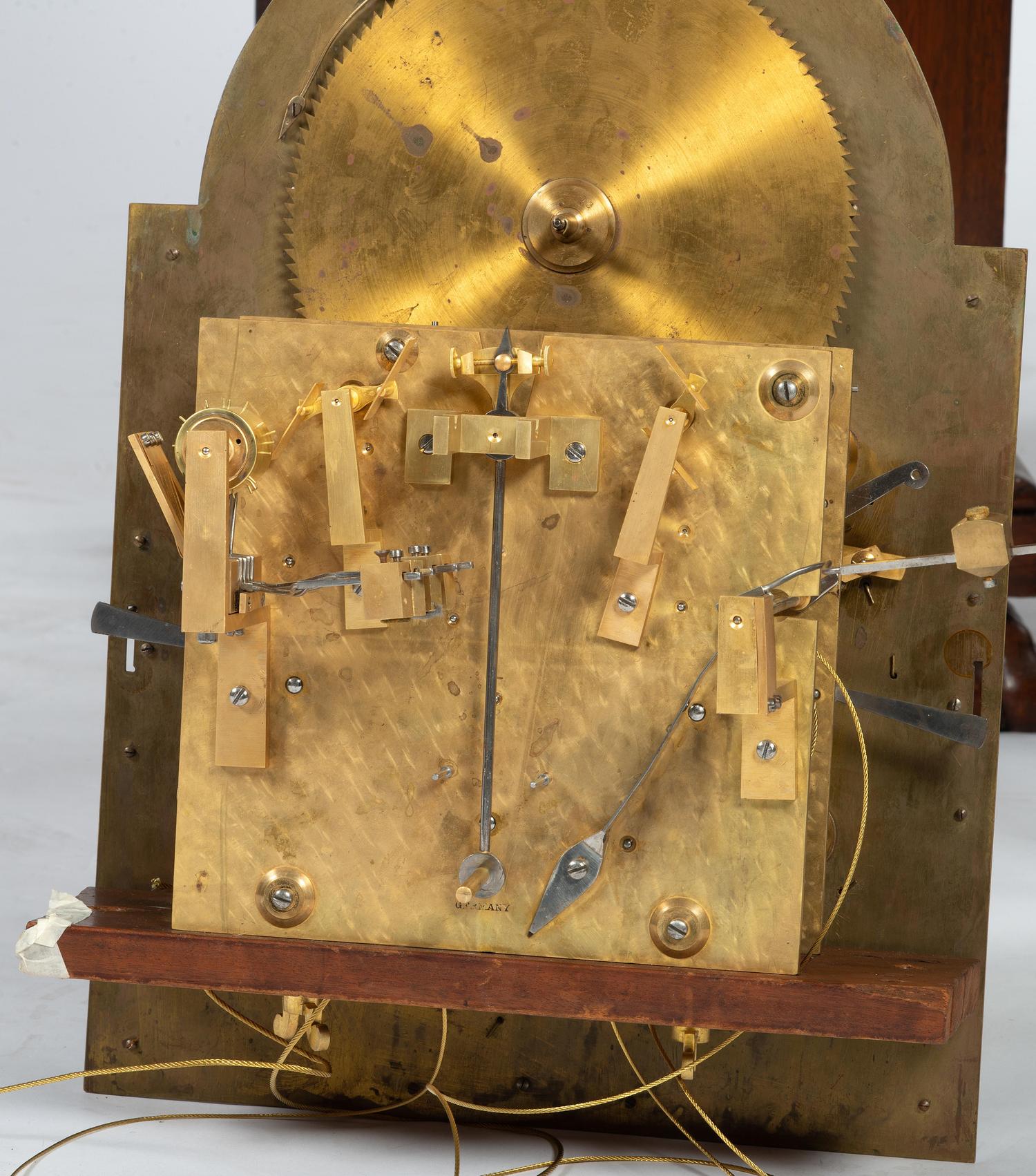 A Winterhalder and Hofmeier Oak Tall Case Clock