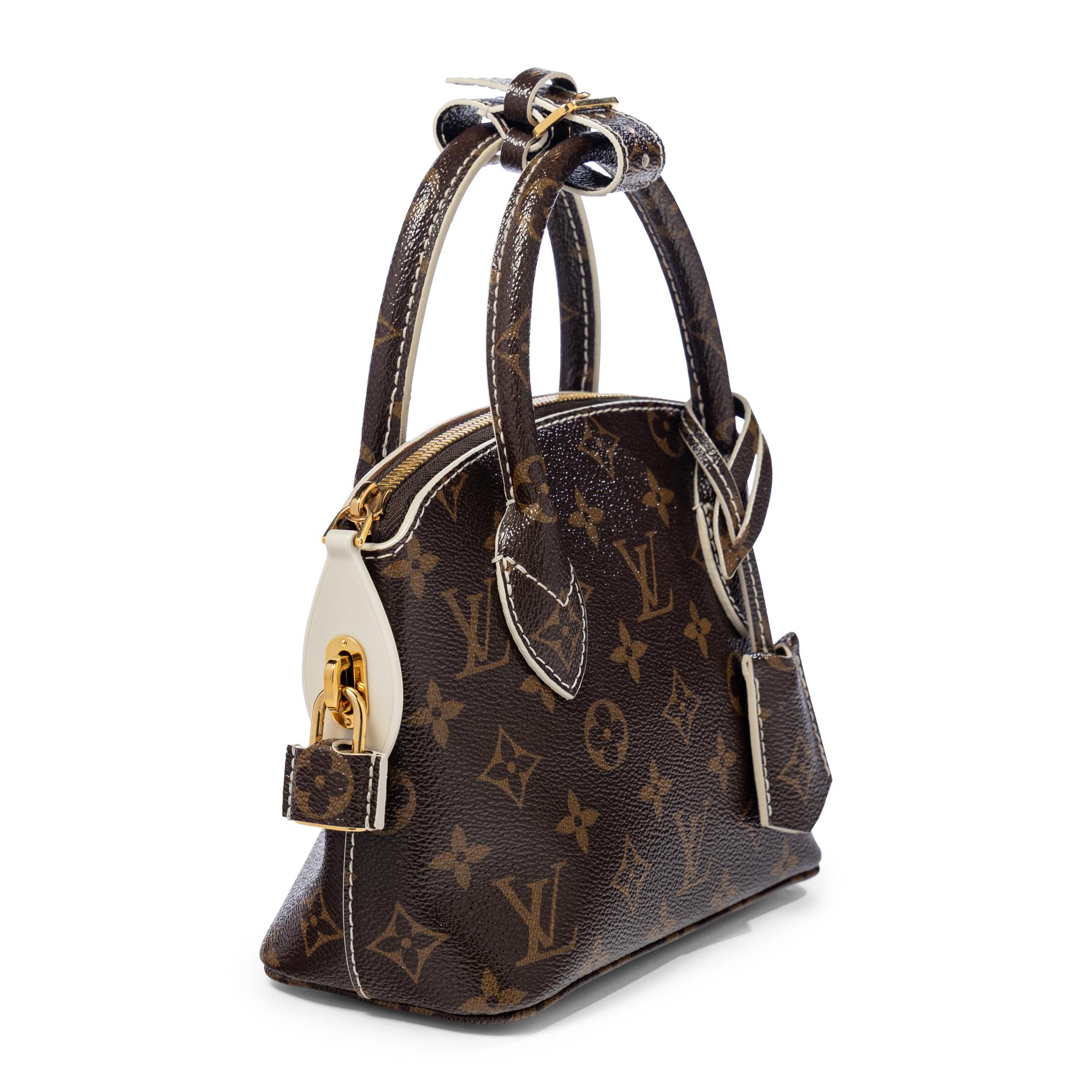 LOUIS VUITTON, MONOGRAM FETISH LOCKIT HANDBAG