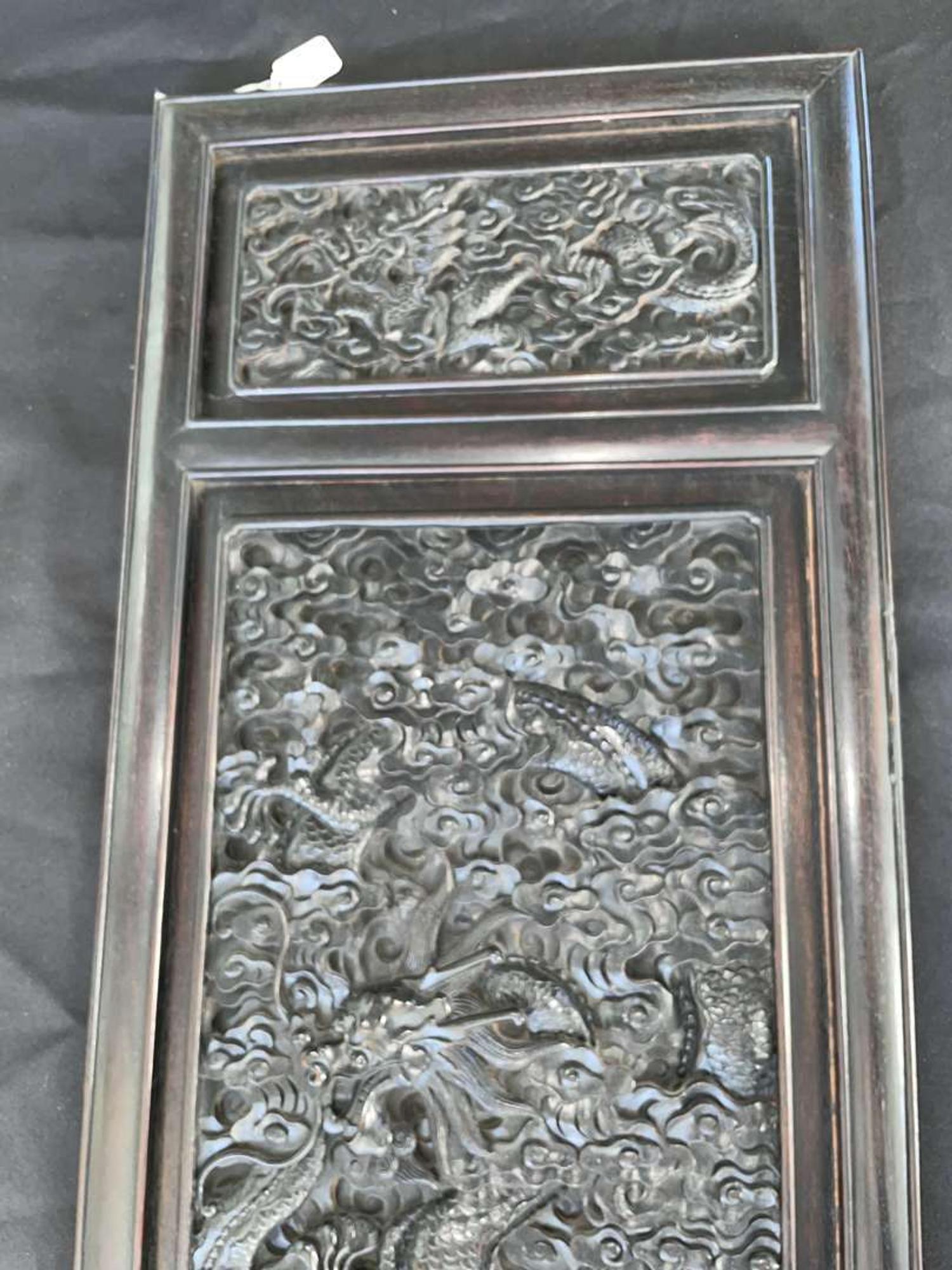 A Chinese carved hardwood six-panel “Dragons” screen 硬木浮雕龙纹六开屏风