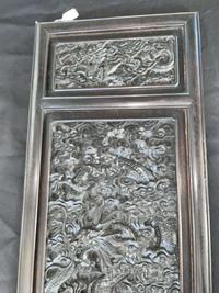 A Chinese carved hardwood six-panel “Dragons” screen 硬木浮雕龙纹六开屏风