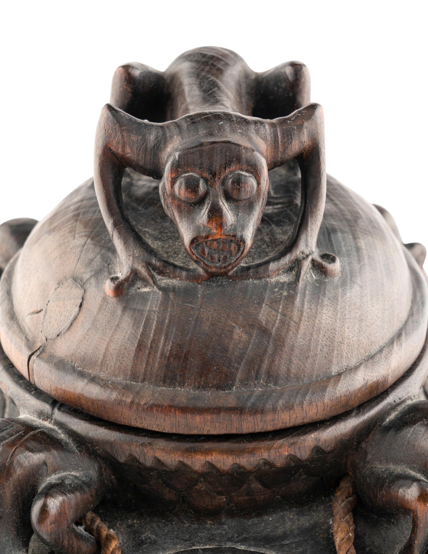 An Oceanic Carved Wood Lidded Vessel