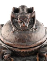 An Oceanic Carved Wood Lidded Vessel