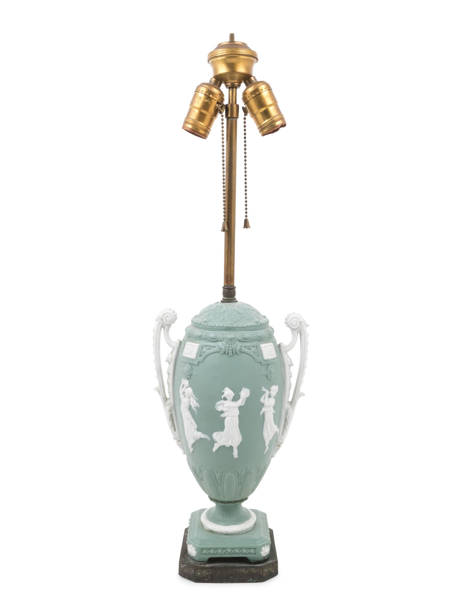 A Continental Bisque Porcelain Urn Mounted as a Lamp