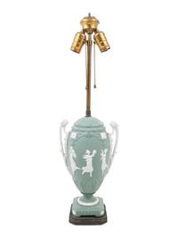 A Continental Bisque Porcelain Urn Mounted as a Lamp