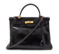 An Hermes 35cm Black Leather Kelly Bag, 14 x 8 x 7 inches.