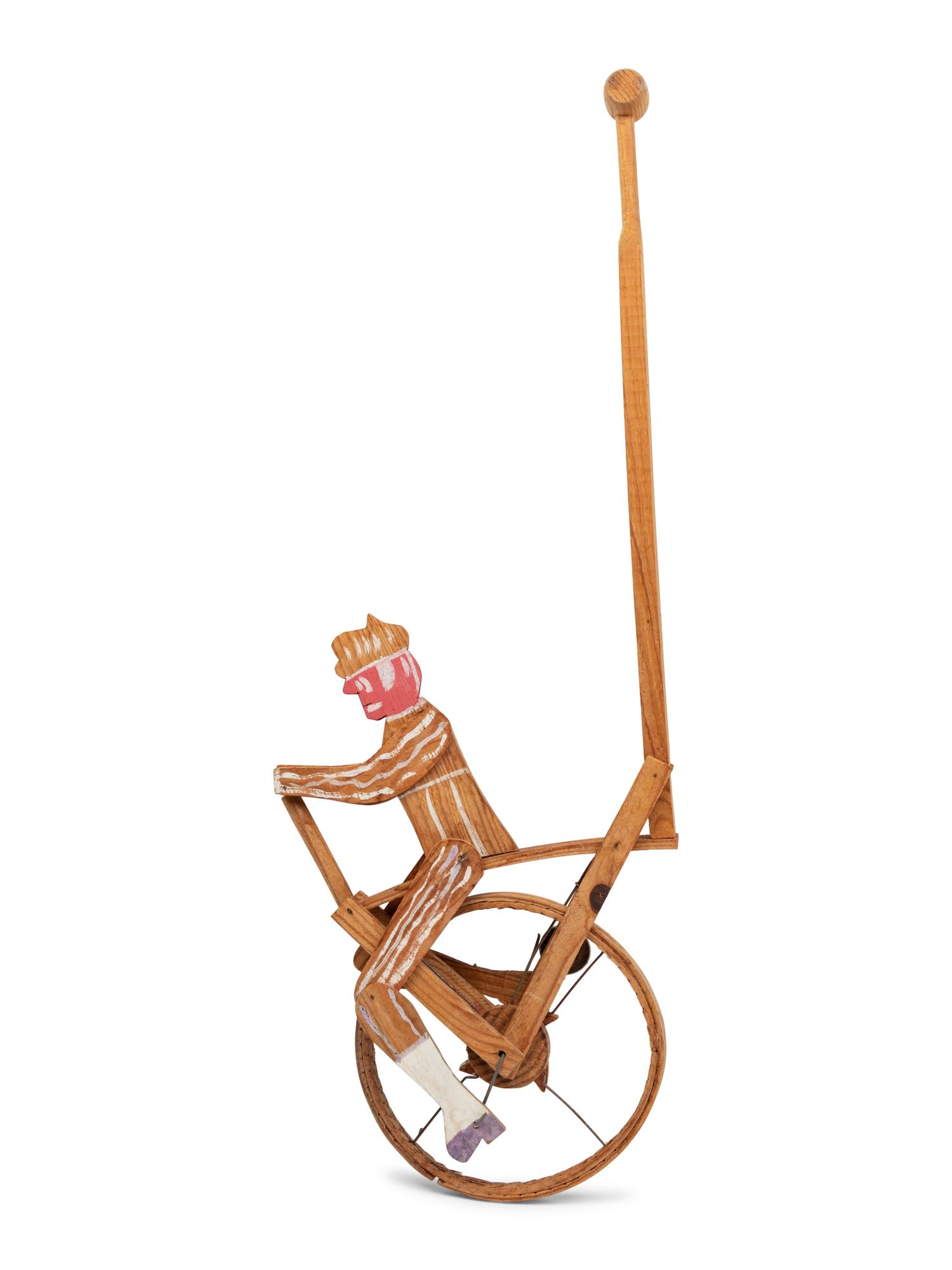 A Child’s Carved and Painted Wood Unicycle Push Toy