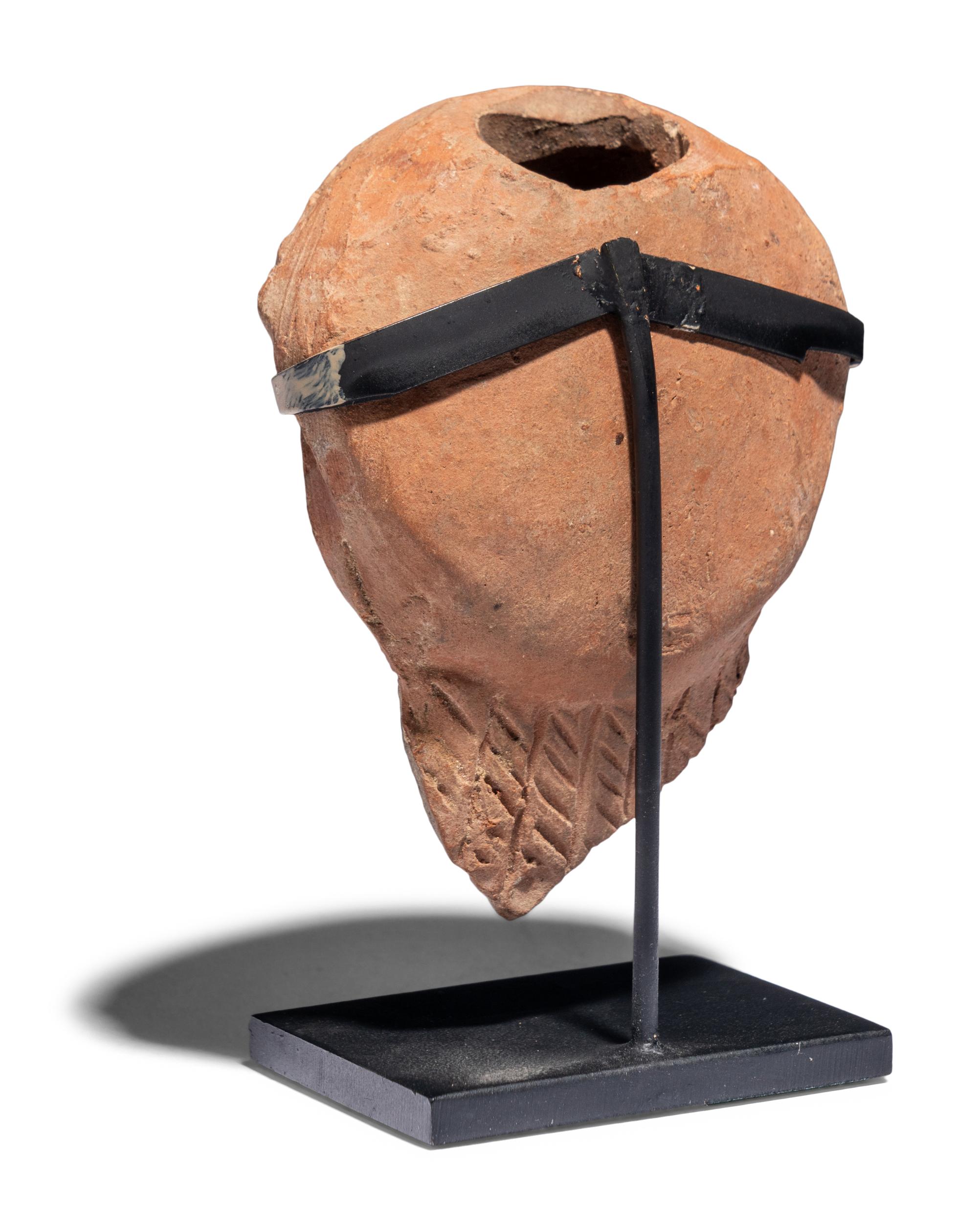 A Hellenistic Terracotta Head of a Goddess