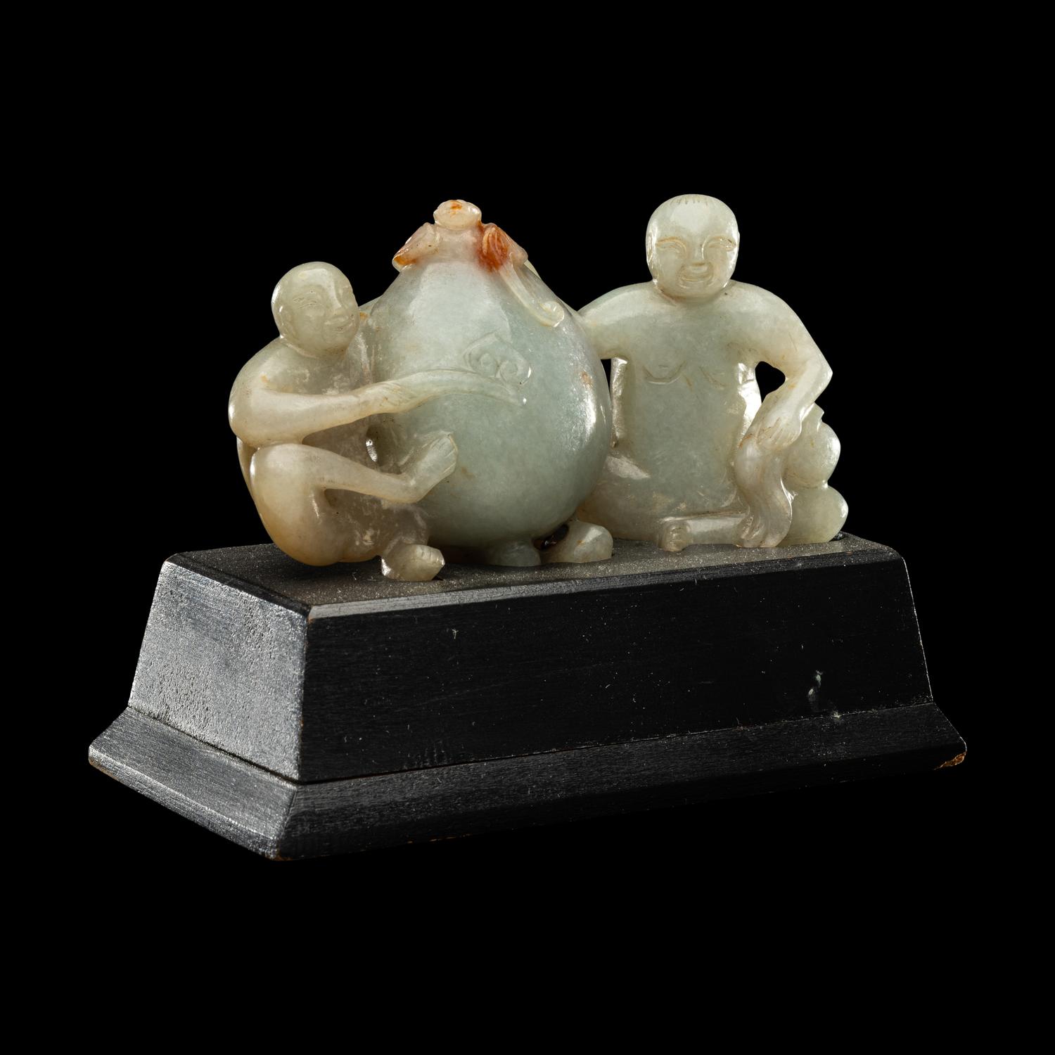 A Chinese Green Jadeite Figural Group of Monkeys and Peach