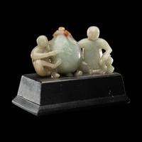 A Chinese Green Jadeite Figural Group of Monkeys and Peach
