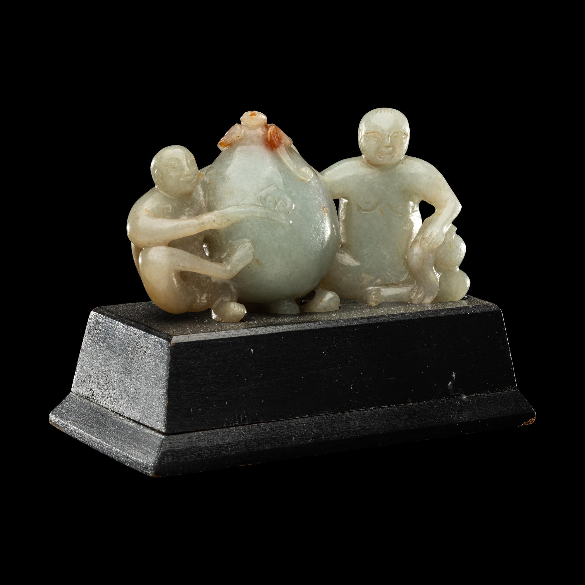 A Chinese Green Jadeite Figural Group of Monkeys and Peach