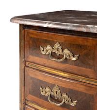 A Régence Gilt Bronze Mounted Marble-Top Commode