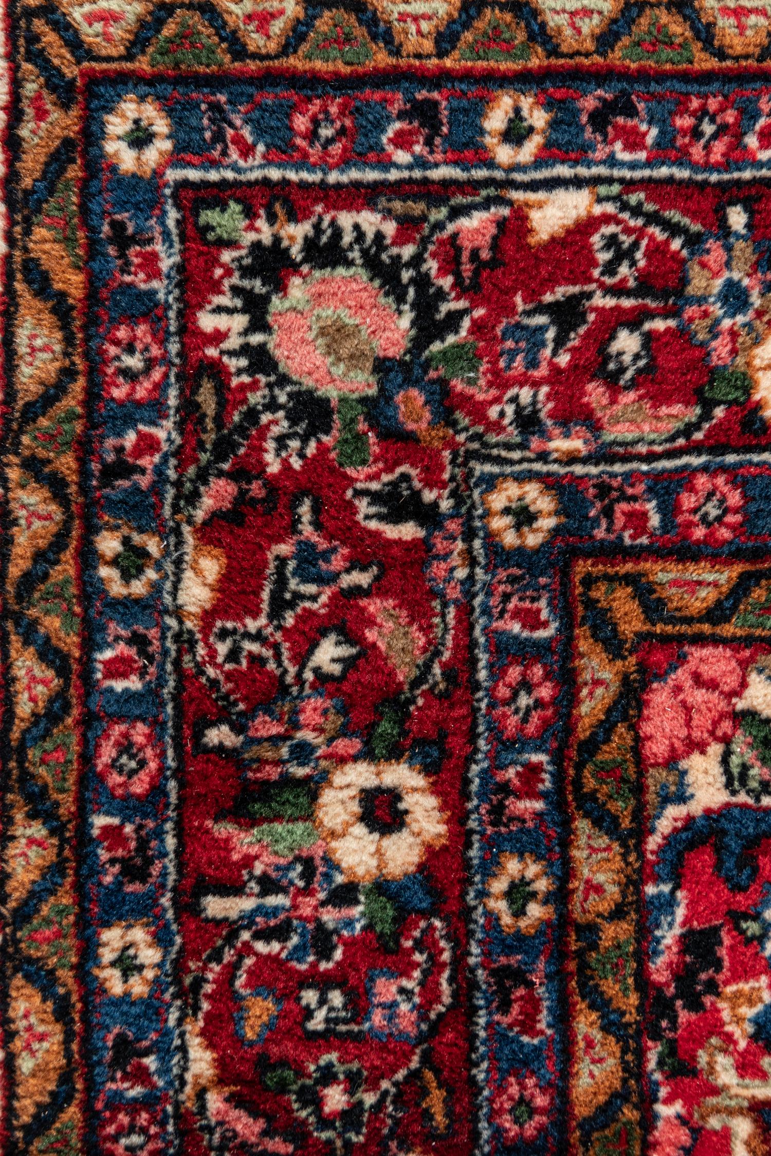 A Kirman Wool Rug