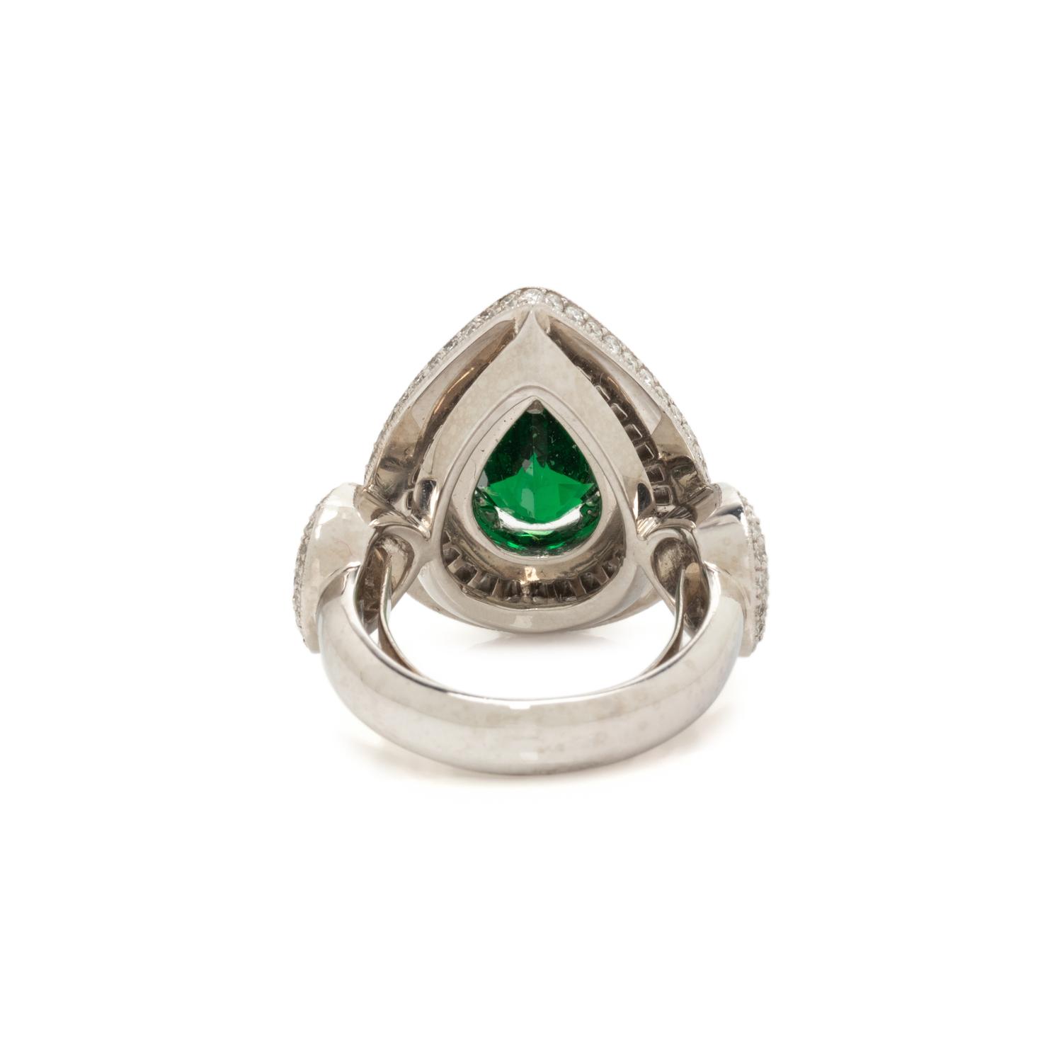 TSAVORITE GARNET AND DIAMOND RING