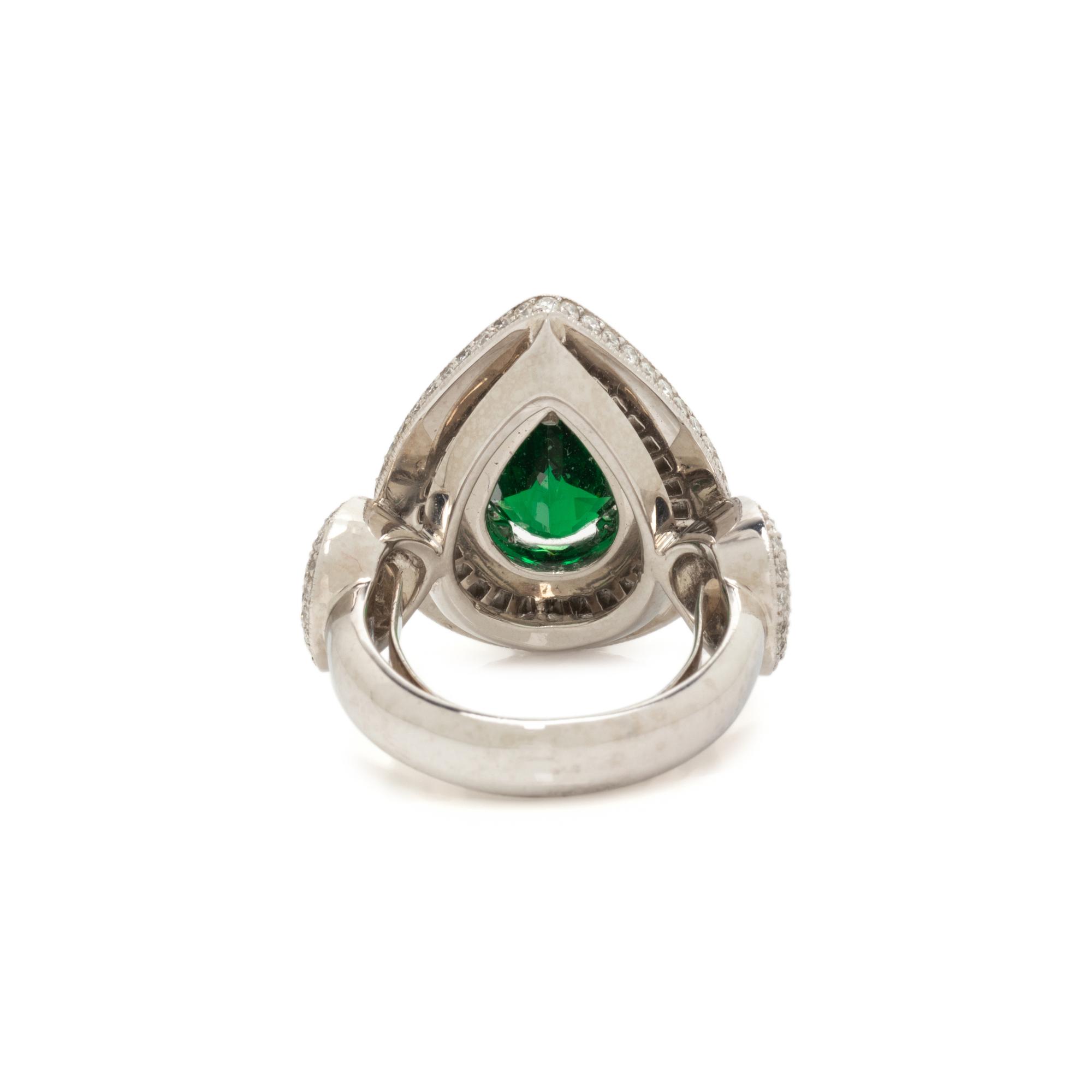 TSAVORITE GARNET AND DIAMOND RING