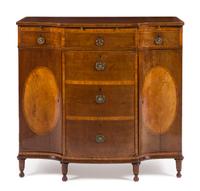 A George III Mahogany and Satinwood Inlaid Breakfront Commode Height 38 x width 41 x depth 22 1/2 inches. — CIRCA 1770