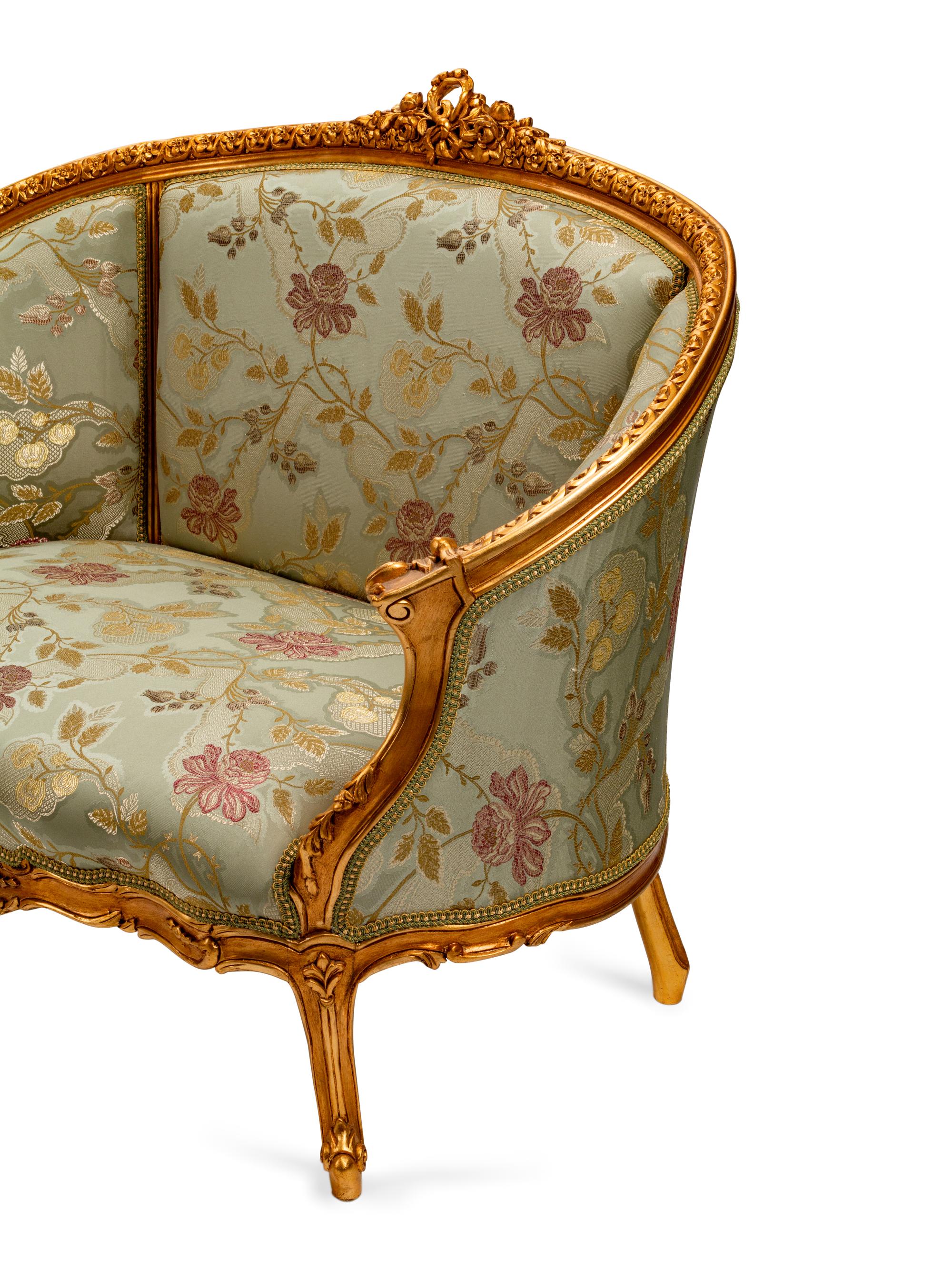 A Pair of Louis XV Style Giltwood Petit Canapes