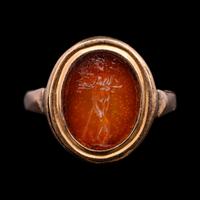 A Roman Glass Intaglio Ring with Pan