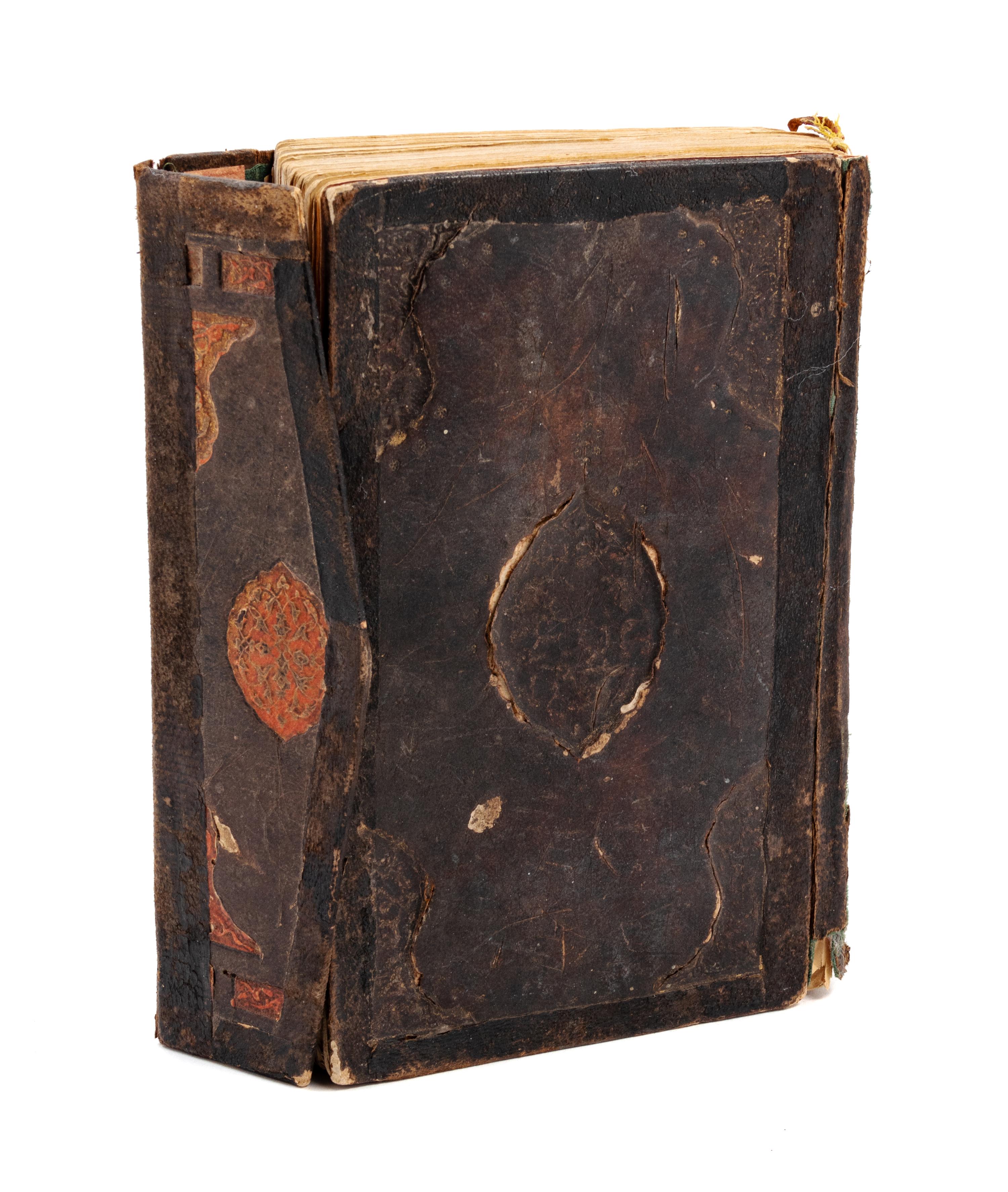Qur'an Text panel 5 x 2 3/4 inches; folio 7 x 5 inches.