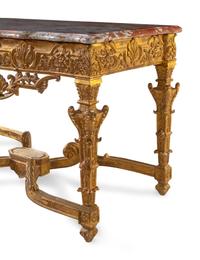 An Italian Carved Giltwood Marble-Top Console Table