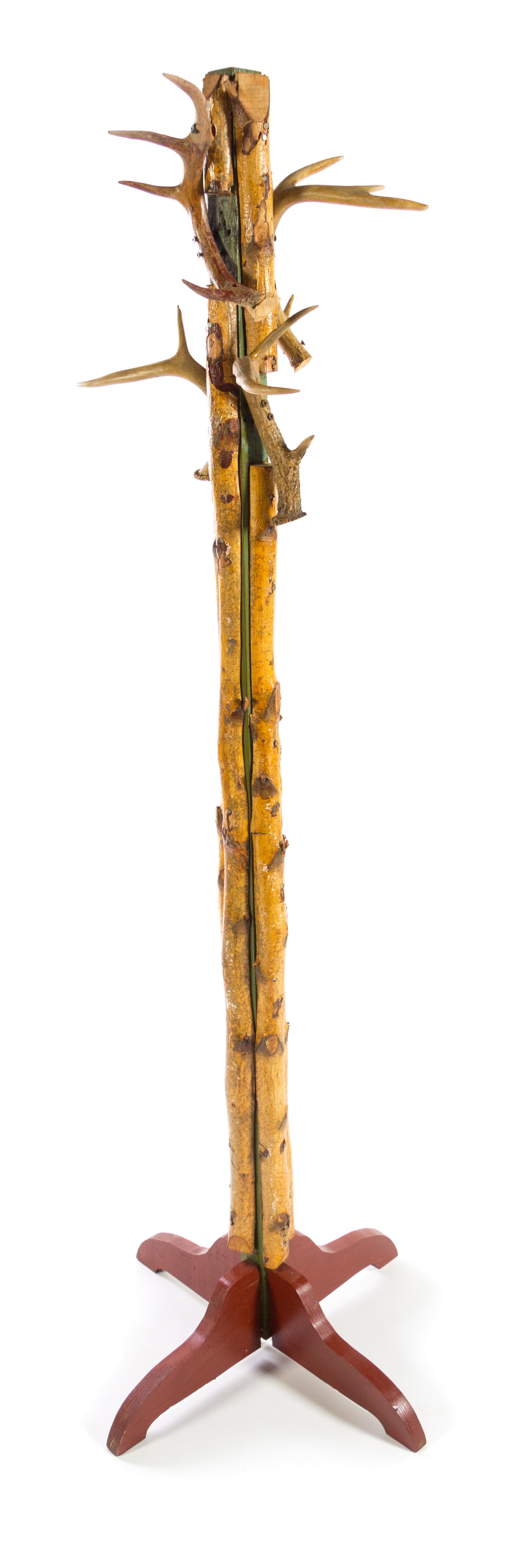 A Rustic Style Antler-Mounted Coat Rack Height 66 inches.
