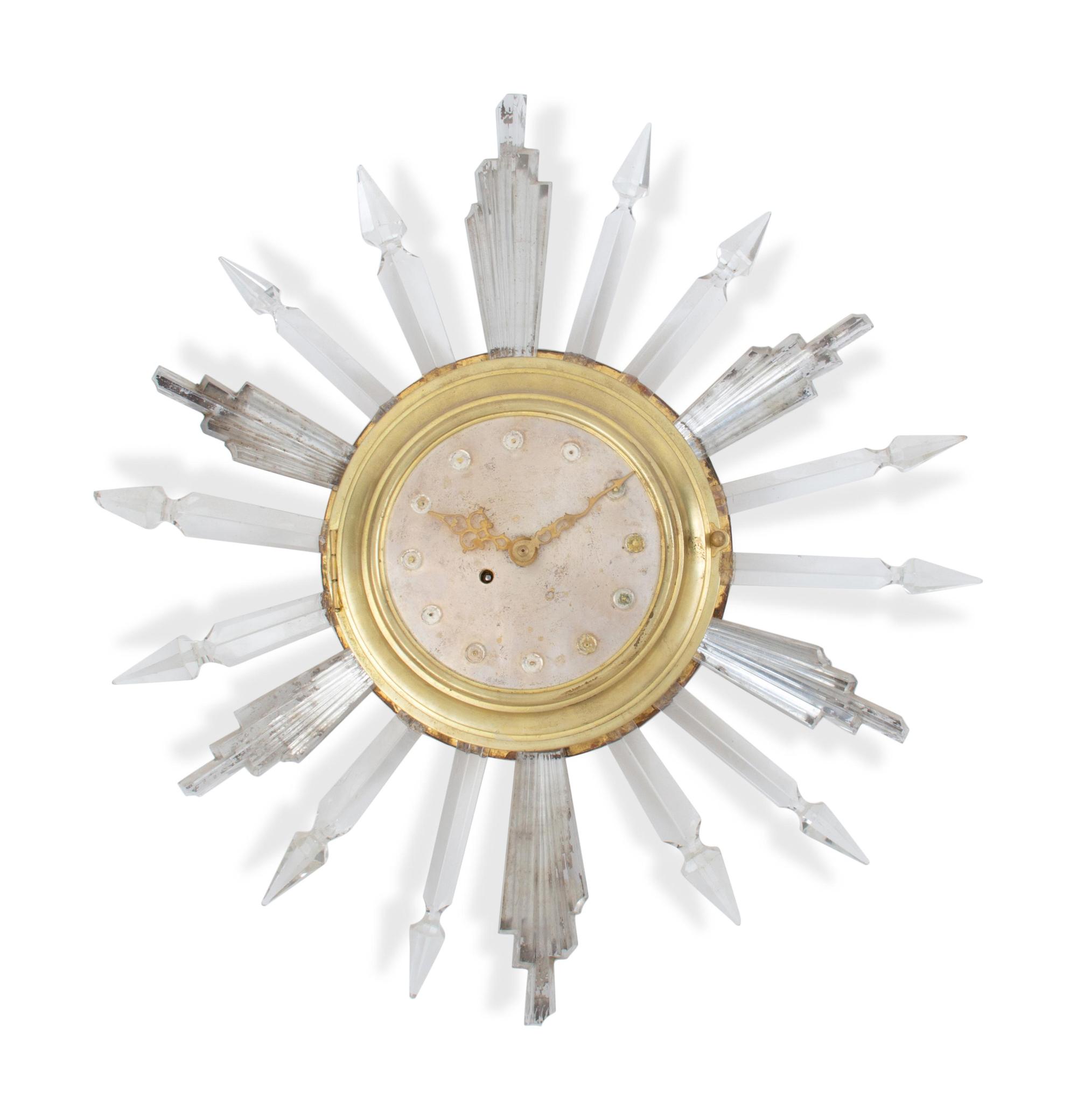 A Continental Gilt Metal and Glass Sunburst Clock