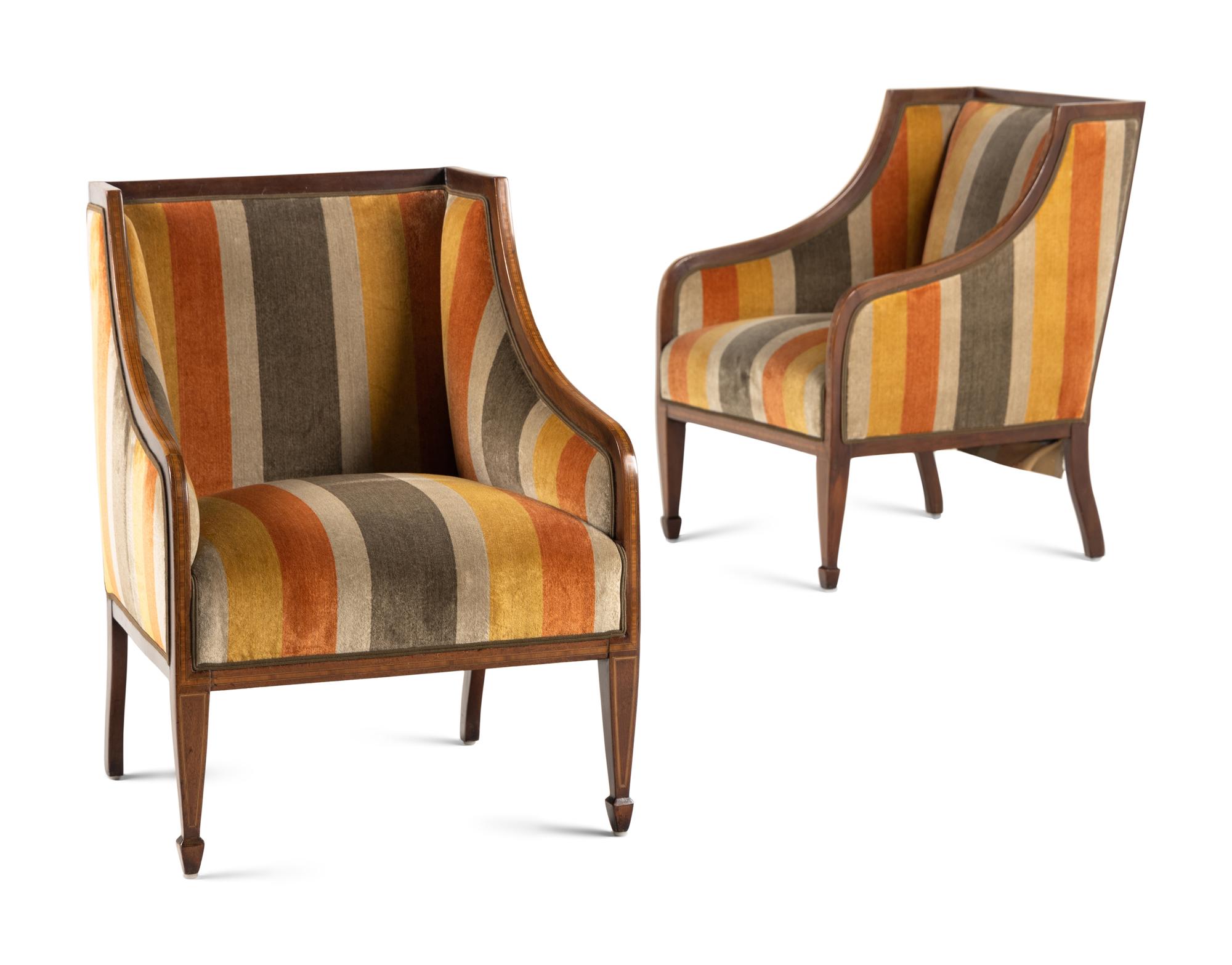 A Pair of Continental Walnut and Mahogany Bergères with Associated Ottomans