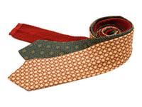 Three Hermes ties, one yellow, one green, one burnt orange knit