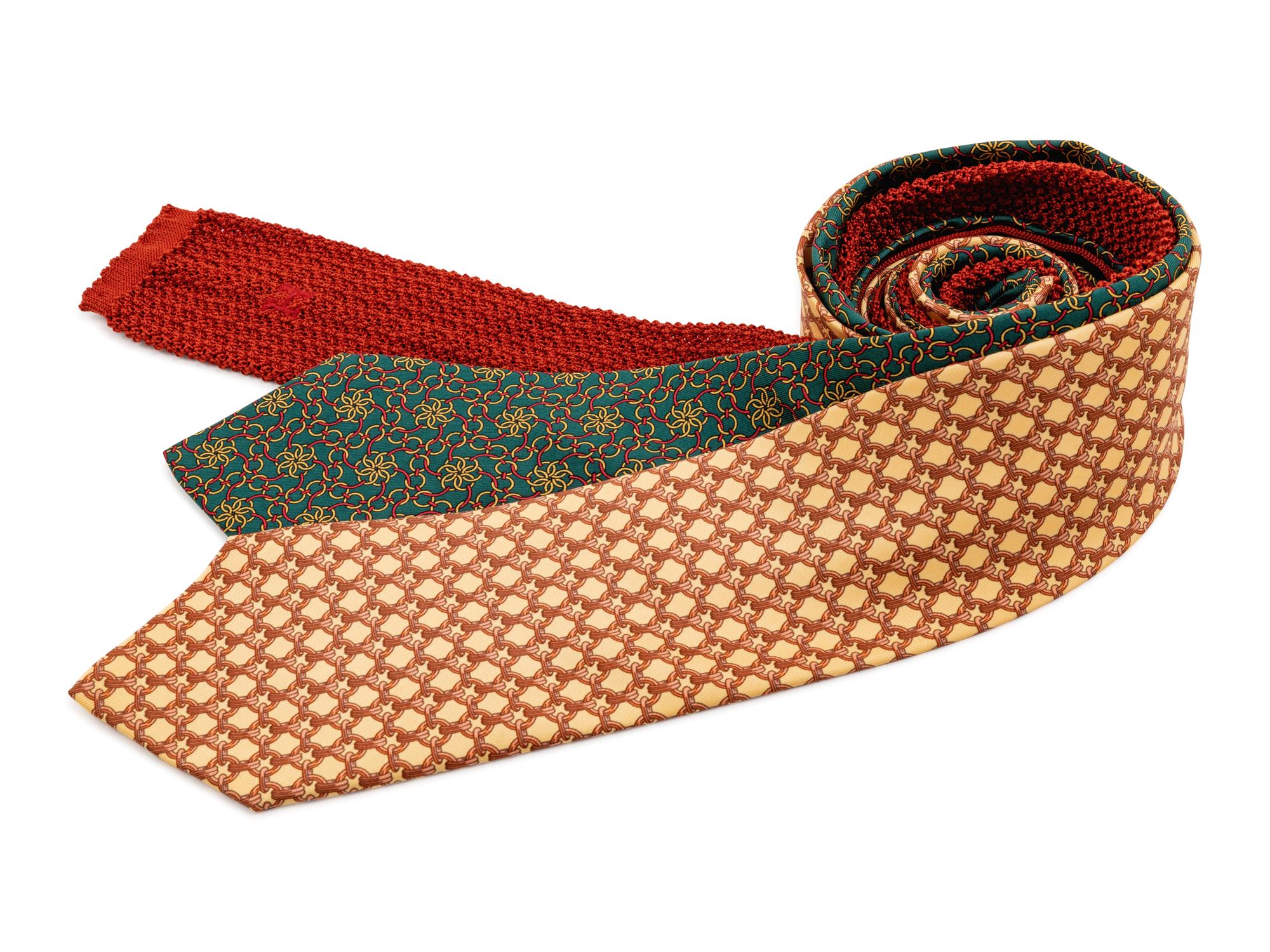 Three Hermes ties, one yellow, one green, one burnt orange knit