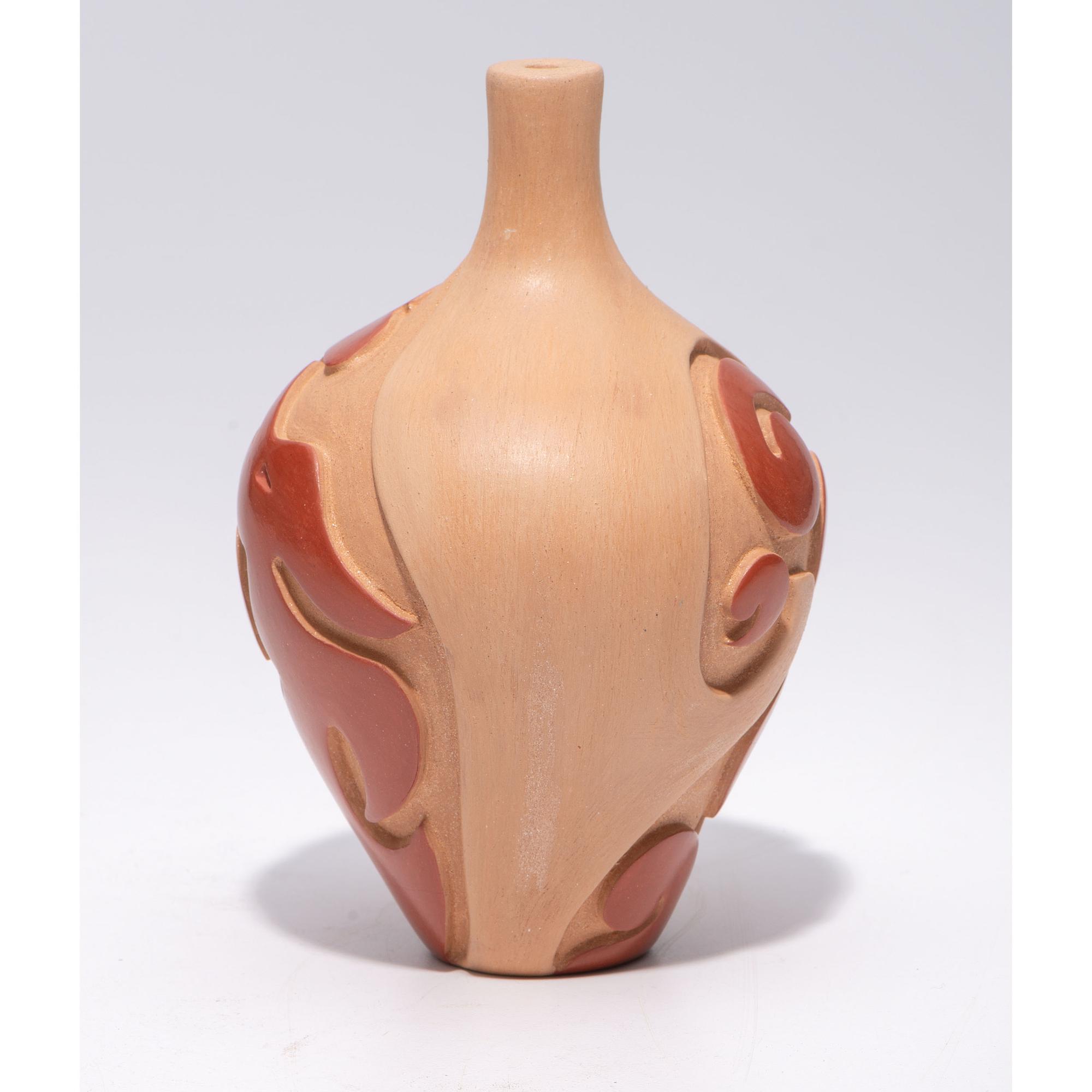 Carved Micaceous Redware Jar, with Avanyu and Raindrops