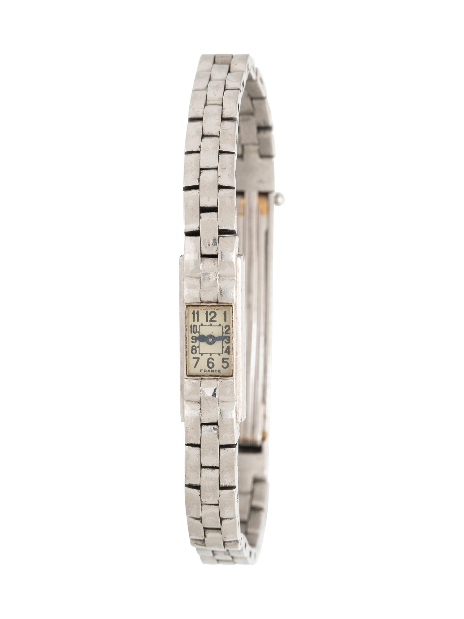 CARTIER, PLATINUM AND WHITE GOLD MINI WATCH