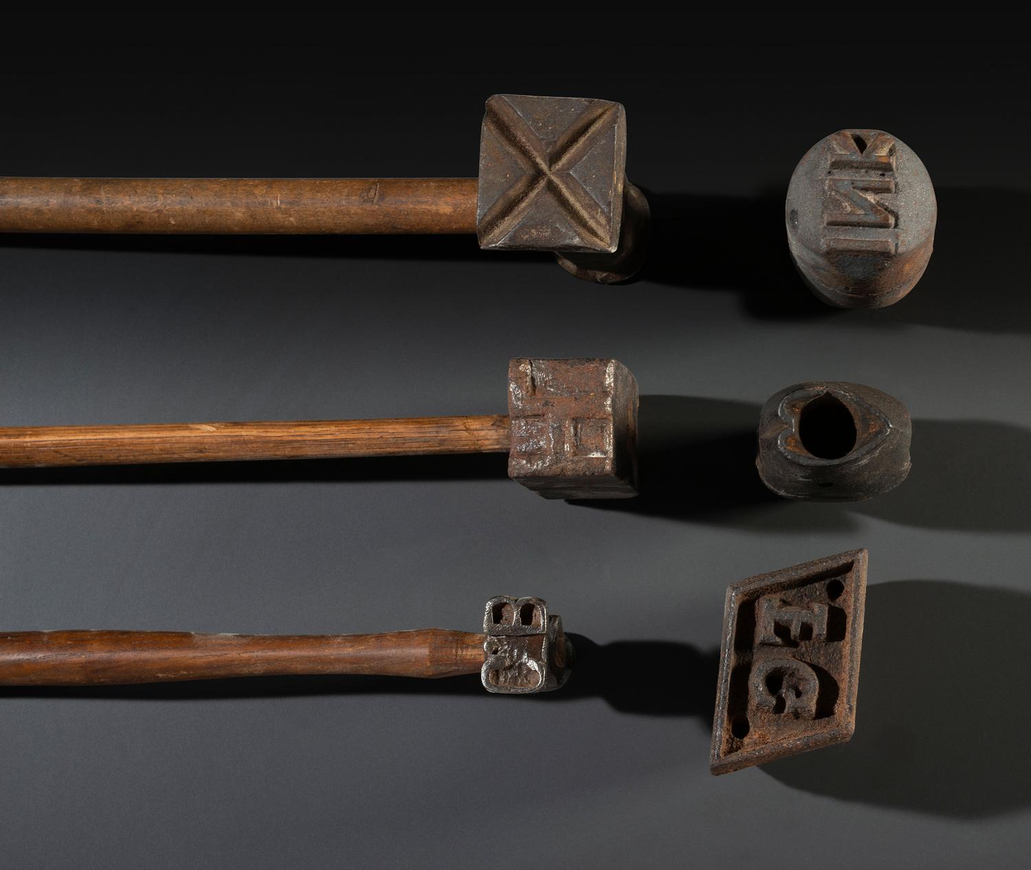 Ten Cast Iron Logging Stamps and Hammers