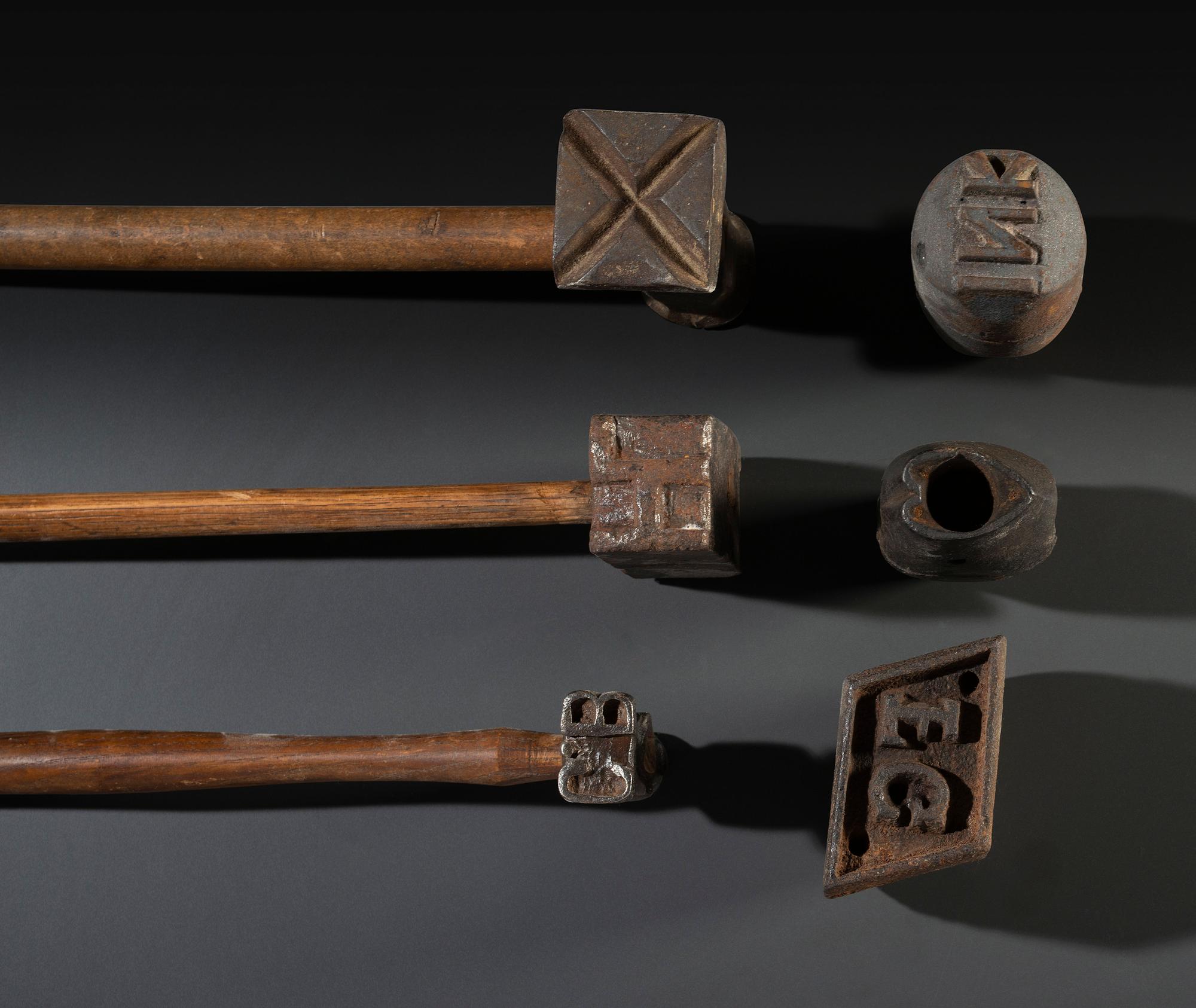 Ten Cast Iron Logging Stamps and Hammers