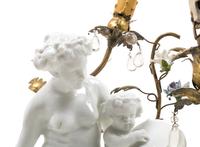 A Gilt Metal Mounted White Glazed Porcelain Figural Group after Clodion Mounted as a Lamp