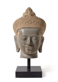 A Large Cambodian Carved Stone Head of Buddha Height 30 inches. — 20TH CENTURY