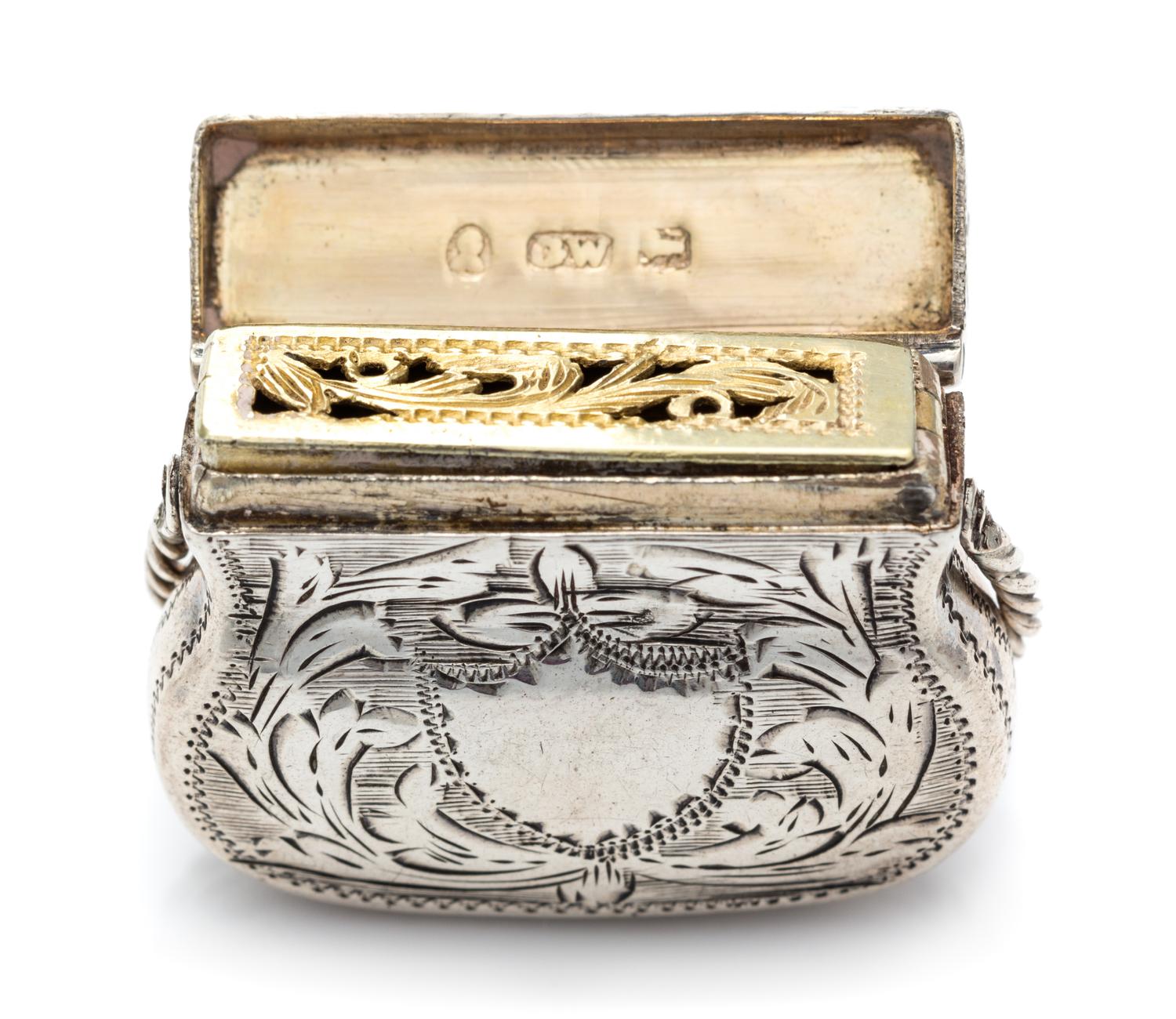 A George III Silver Vinaigrette, Maker's Mark GW, Birmingham, Likely 1768, in the form of a purse.