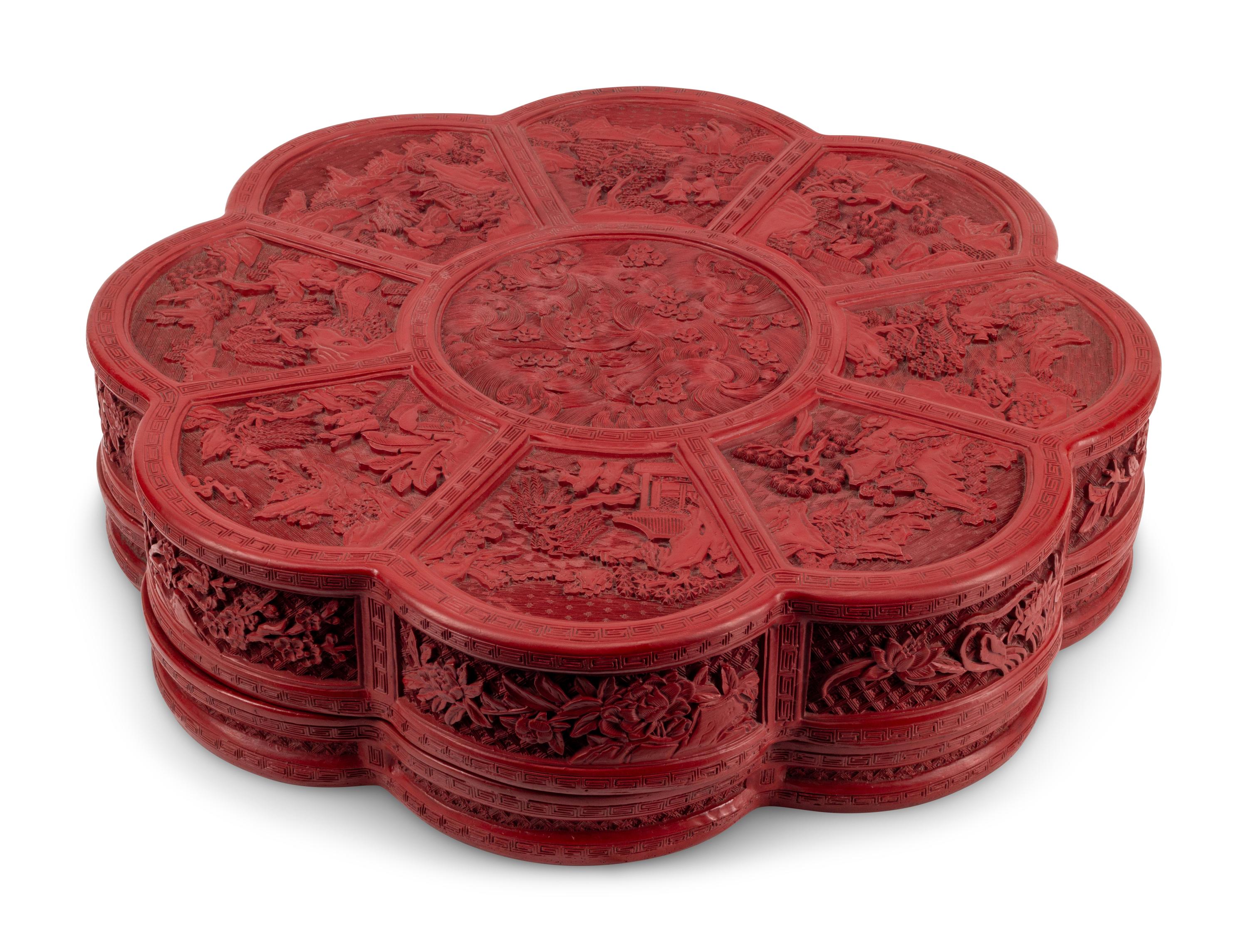 A Large Chinese Carved Red Lacquer Box and Cover