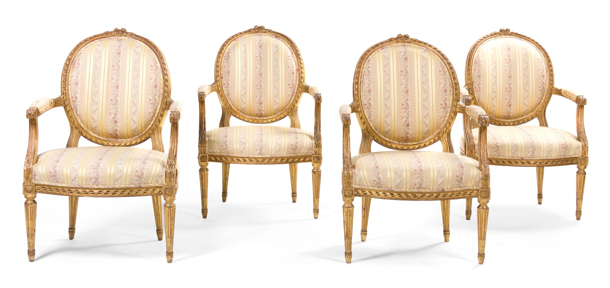 A Louis XVI Style Giltwood Parlor Suite, Width of canape 63 1/2 inches.