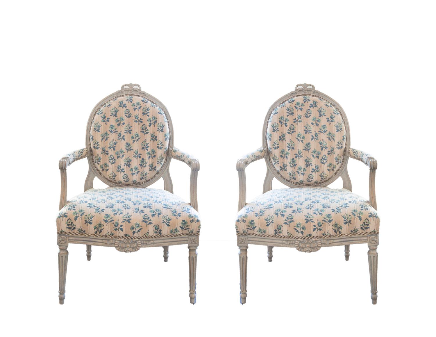 A Pair of Louis XVI Carved and Gray Painted Fauteuils