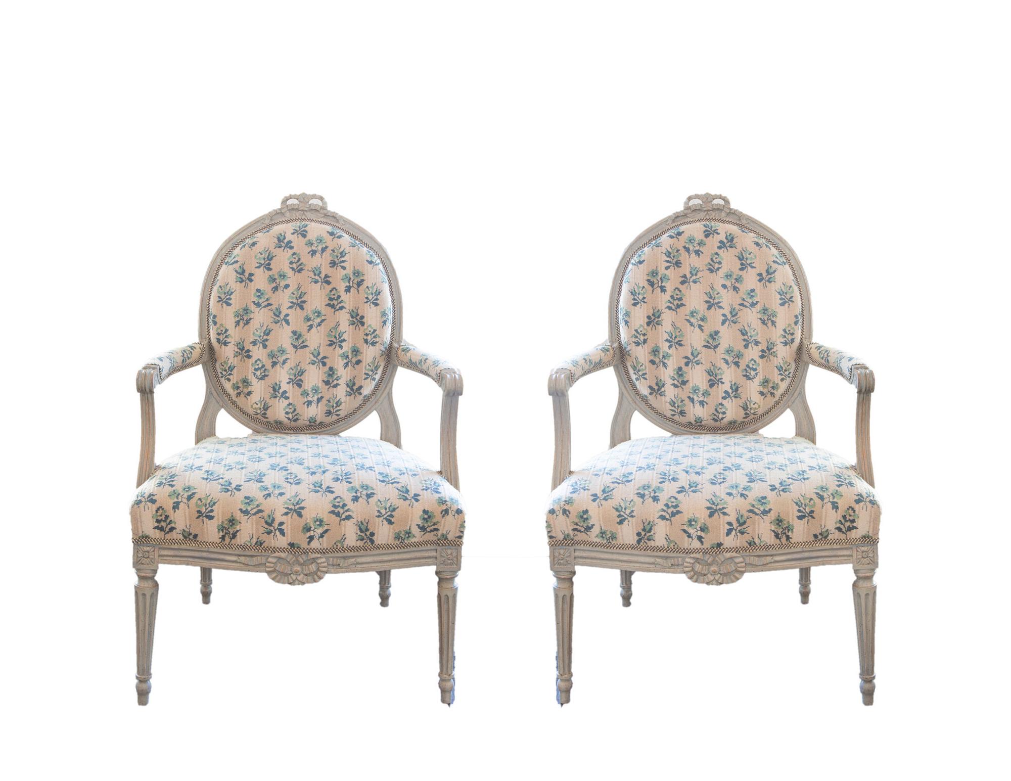 A Pair of Louis XVI Carved and Gray Painted Fauteuils